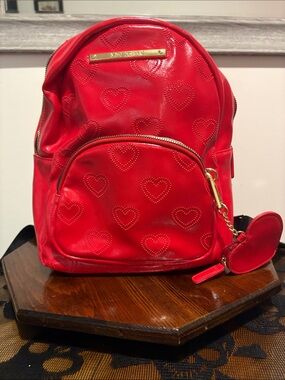 Red Heart-Embossed Women’s Backpack with Gold Accent